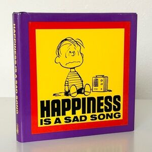 Happiness is a Sad Song hardback book
Charles Schultz Snoopy Charlie Brown